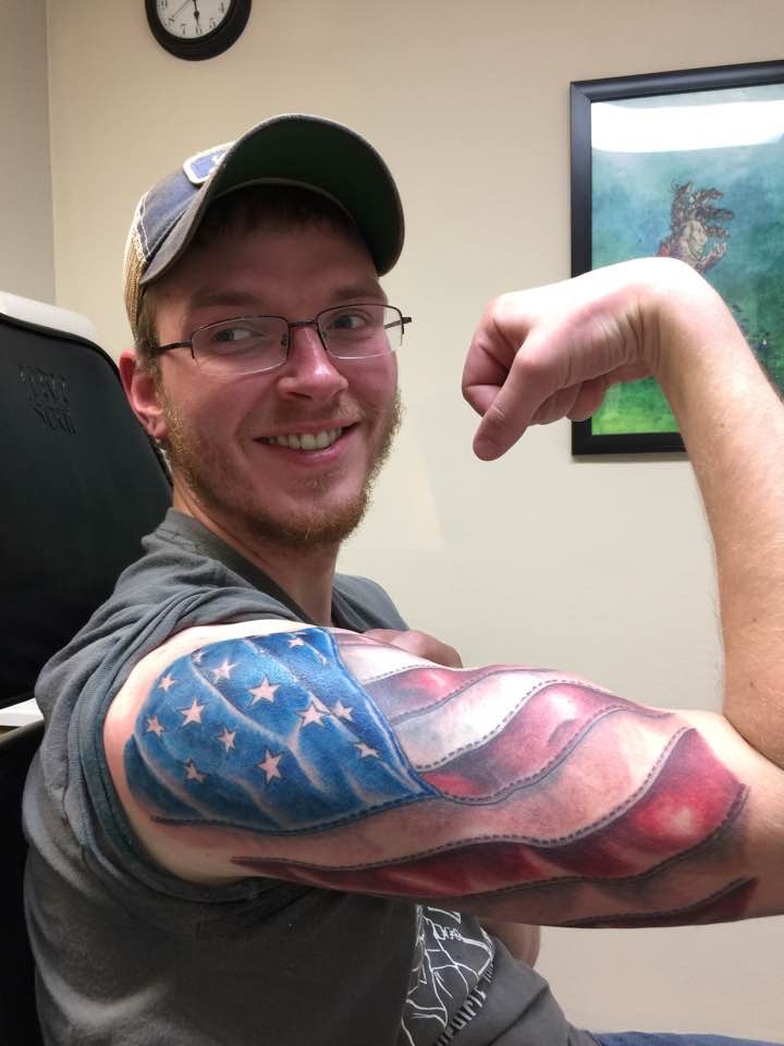 Flag arm tattoo